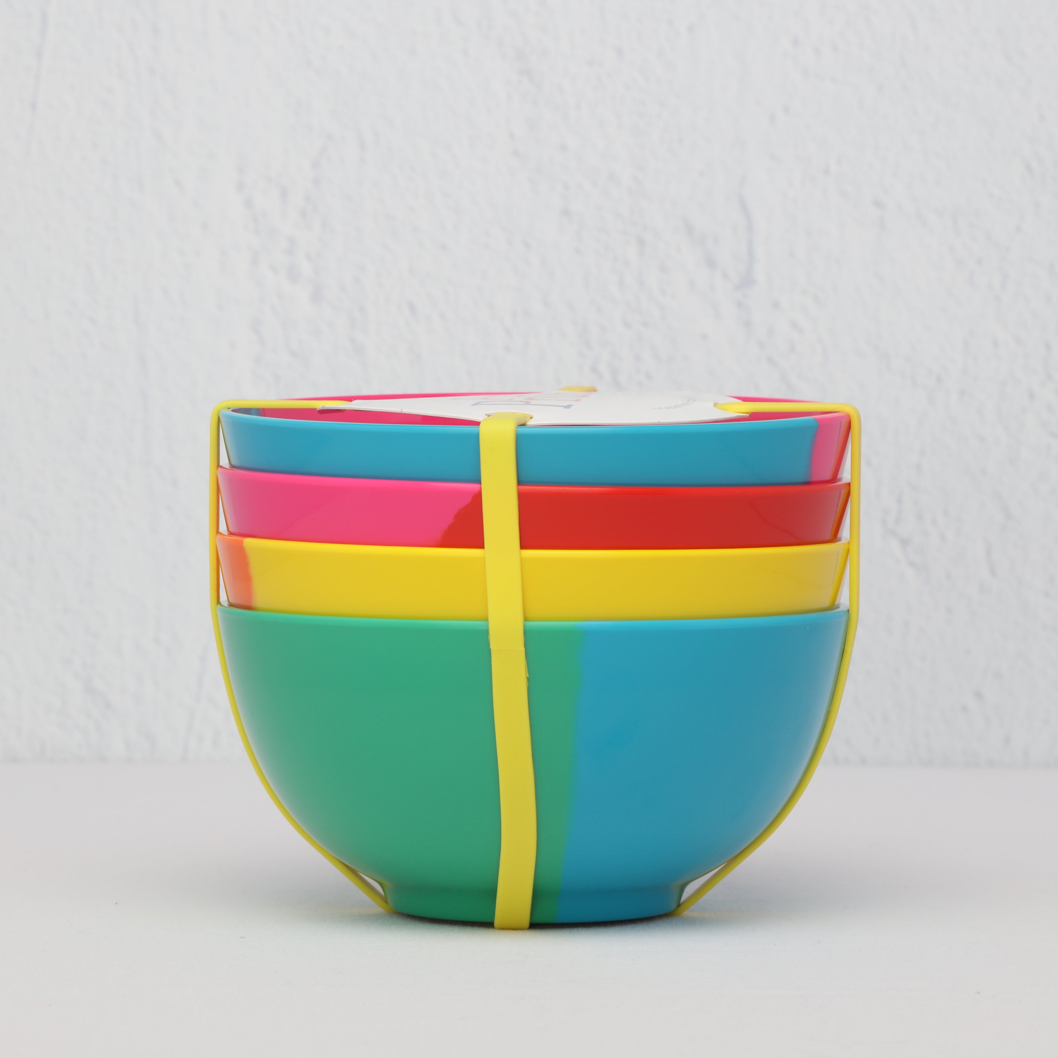 Side view of Prue Leith melamine bowls stacked with packaging