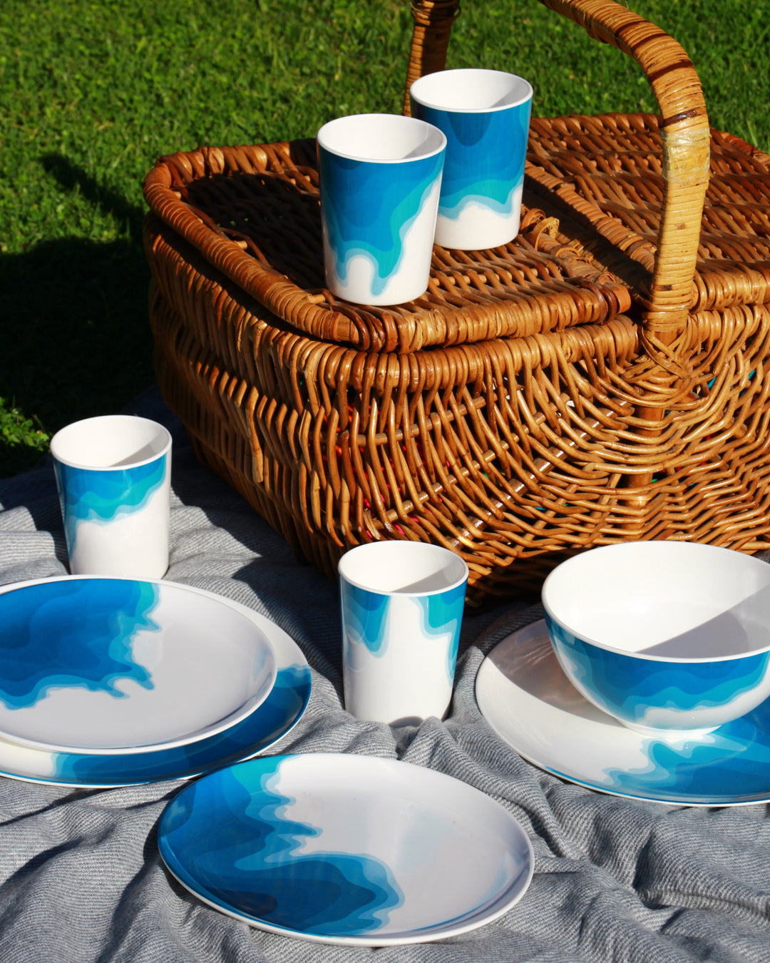 Rick Stein Melamine Picnic Range Outdoor Side view with a picnic basket