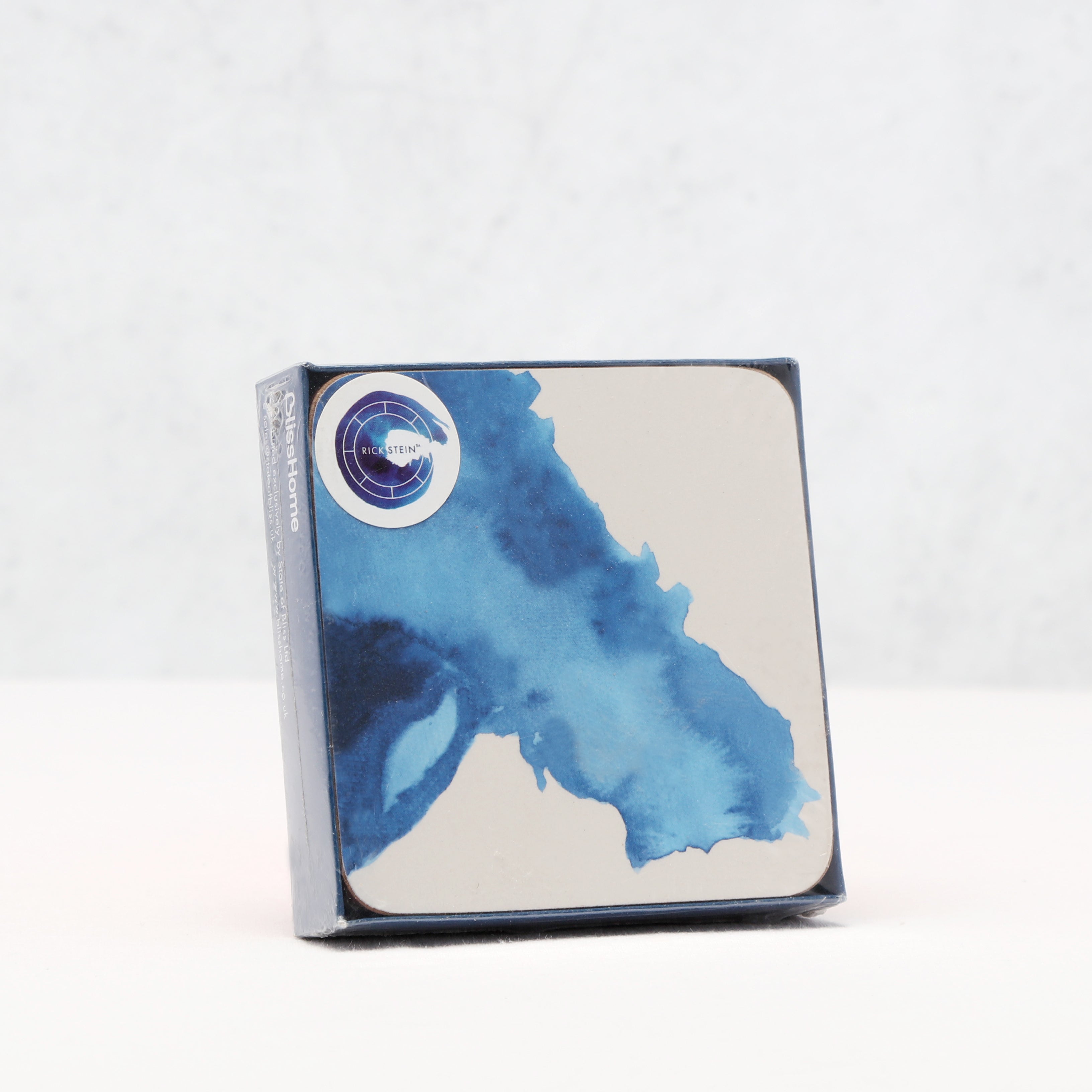 Cardboard box with blue watercolor design on a white background