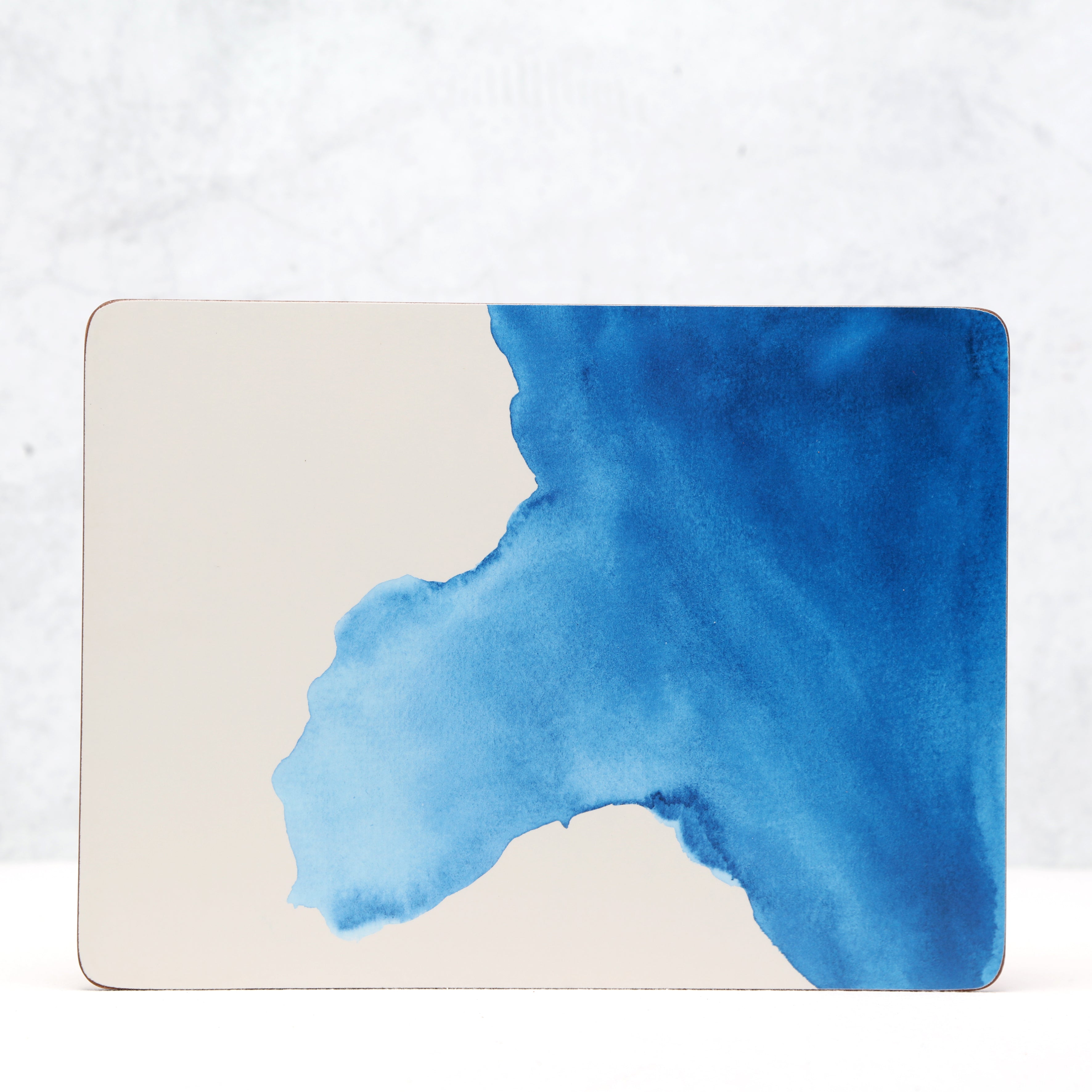 Blue watercolor design on a beige background