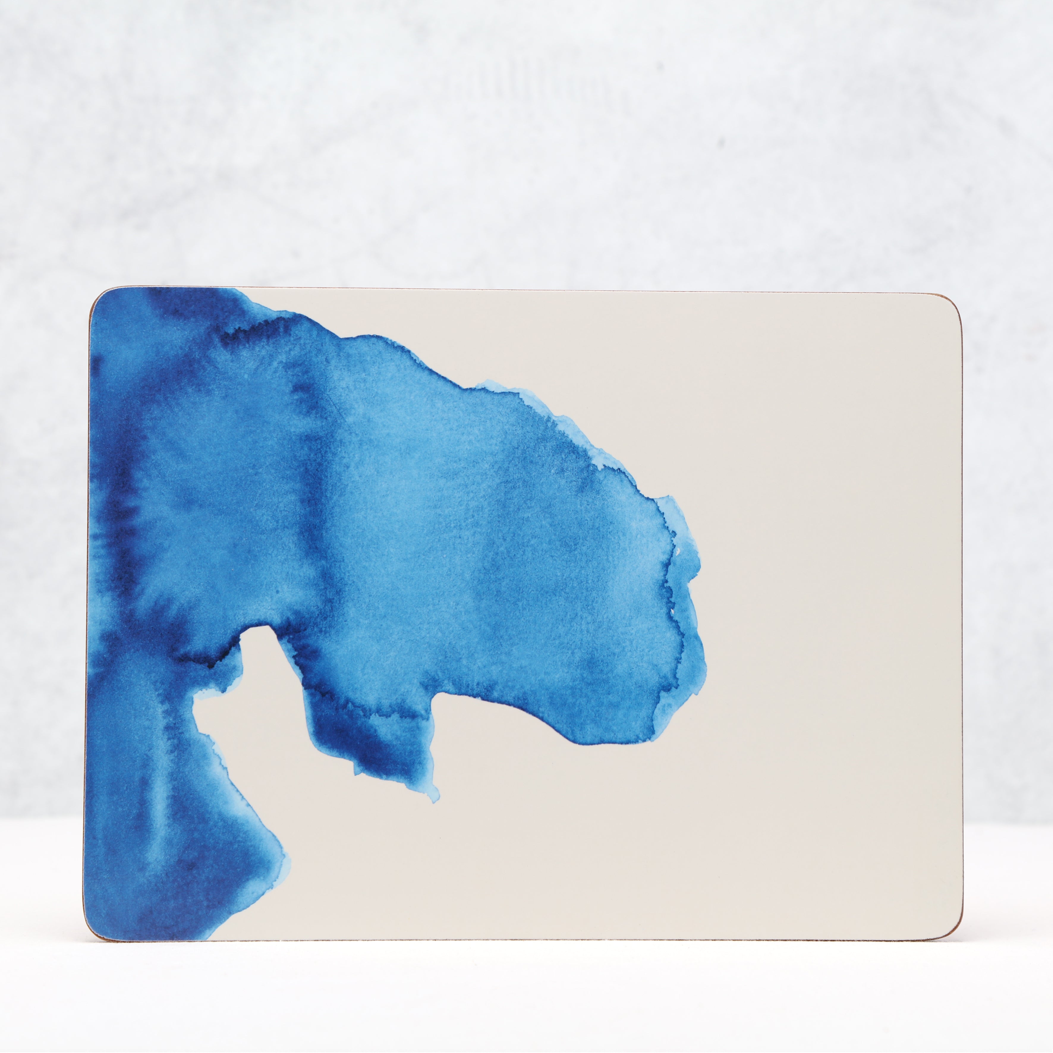 Blue watercolor design on a white background